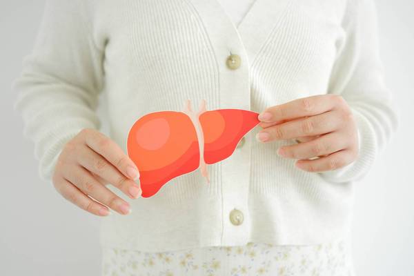 Woman holding liver