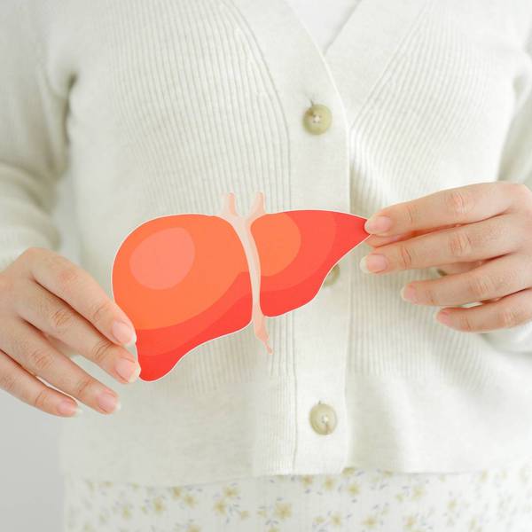 Woman holding liver