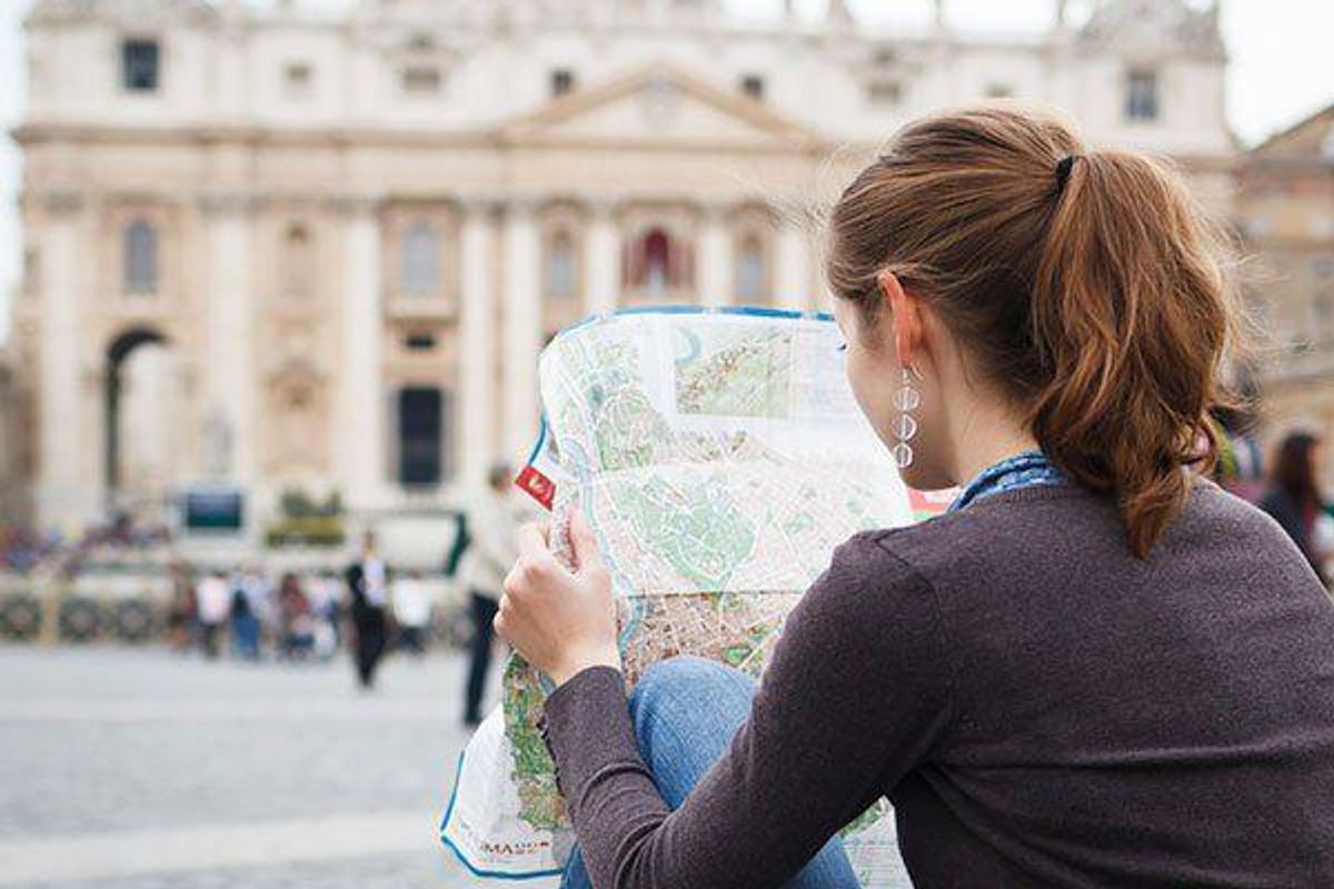 woman in italy looking at a map