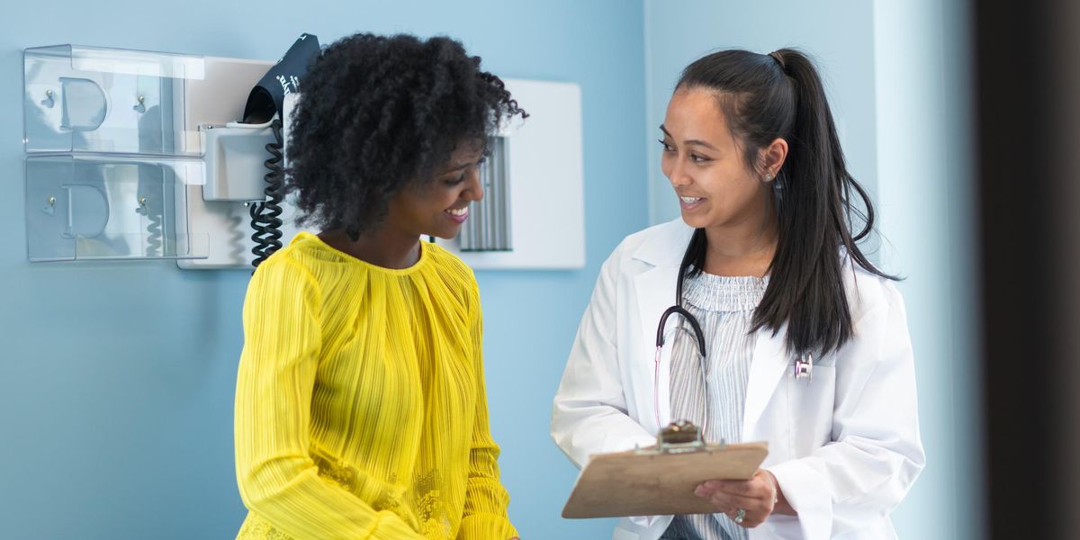 woman in medical consultation with female doctor