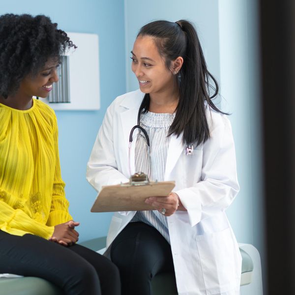 woman in medical consultation with female doctor