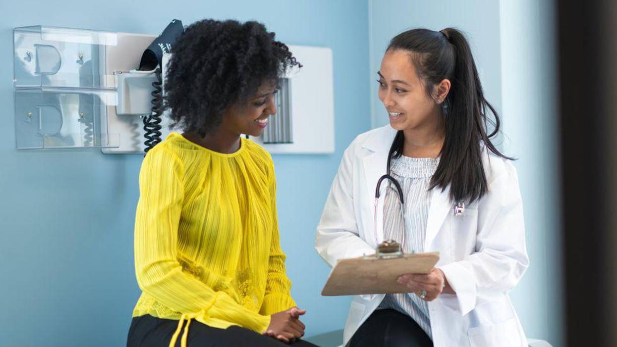 woman in medical consultation with female doctor