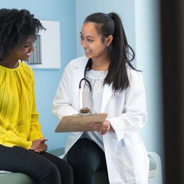 woman in medical consultation with female doctor