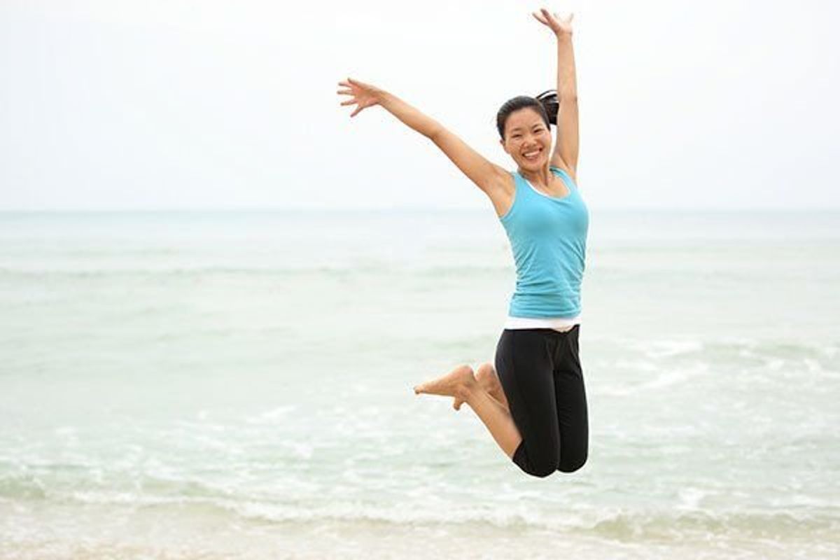 woman jumping in the air