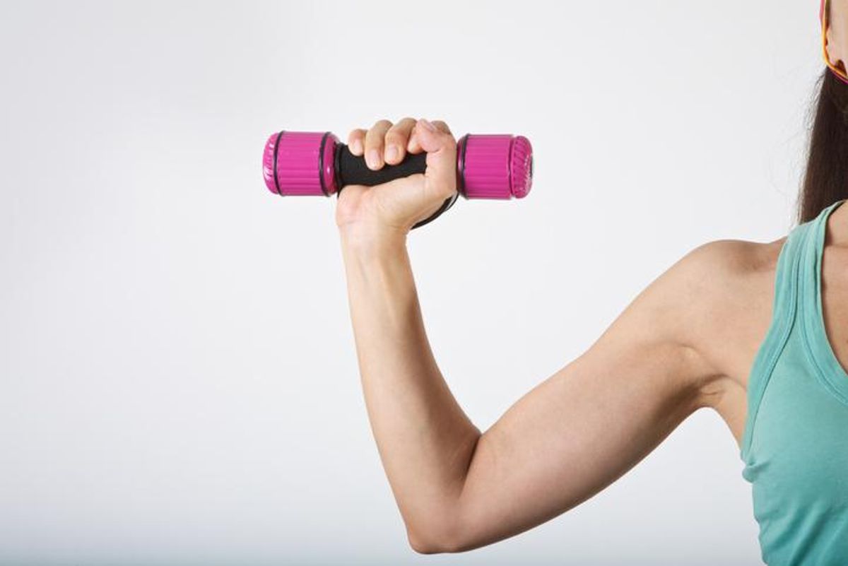 Woman lifting a dumbbell