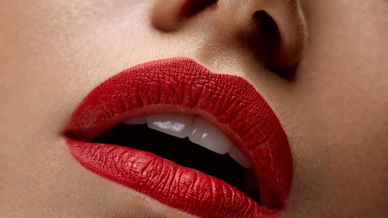 Woman Lips With Red Lipstick On