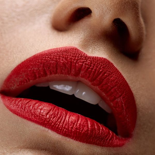 Woman Lips With Red Lipstick On