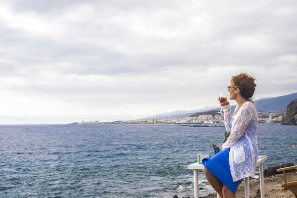 woman looking out at the water