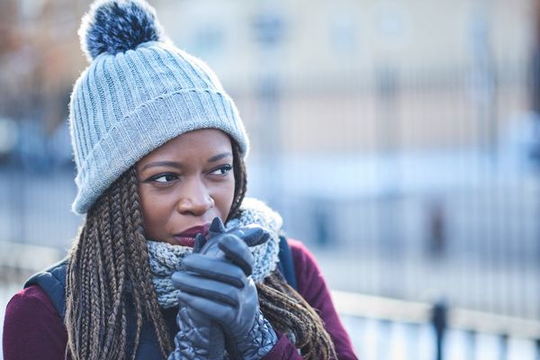 woman looking thoughtful on a wintery day outdoors