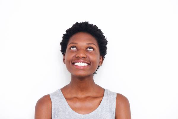 woman looking up and smiling