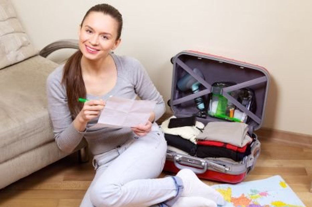 woman packing for a trip
