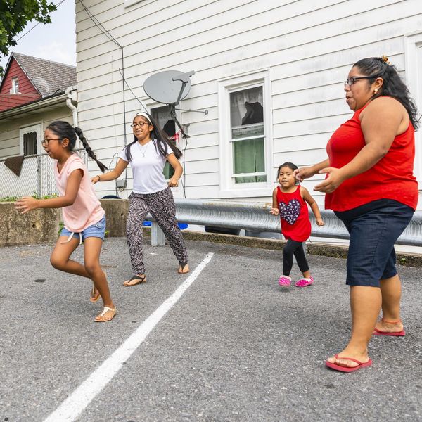 woman playing with her kids