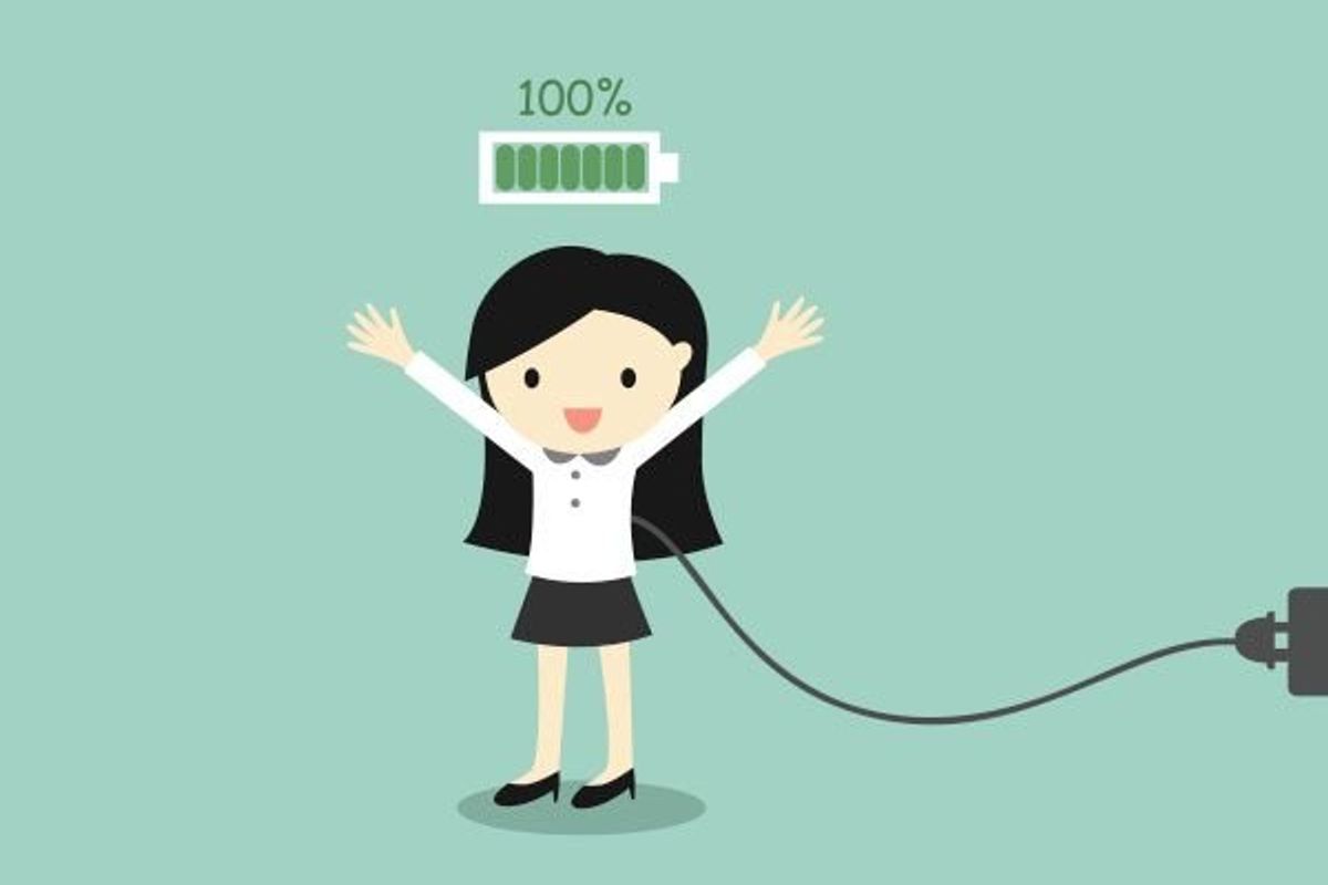 woman plugged into a wall with a battery percentage counter abover her head