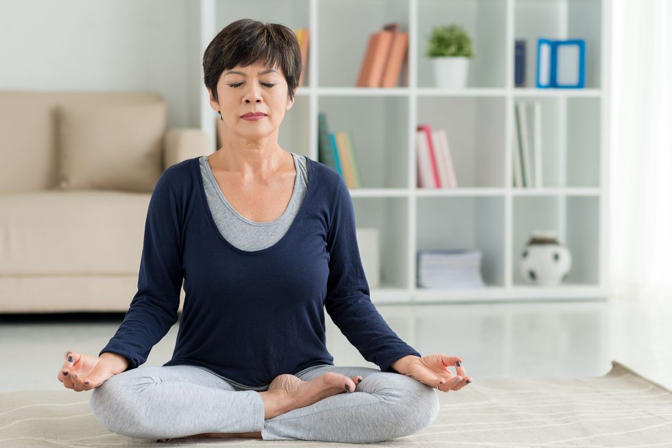 woman practicing yoga