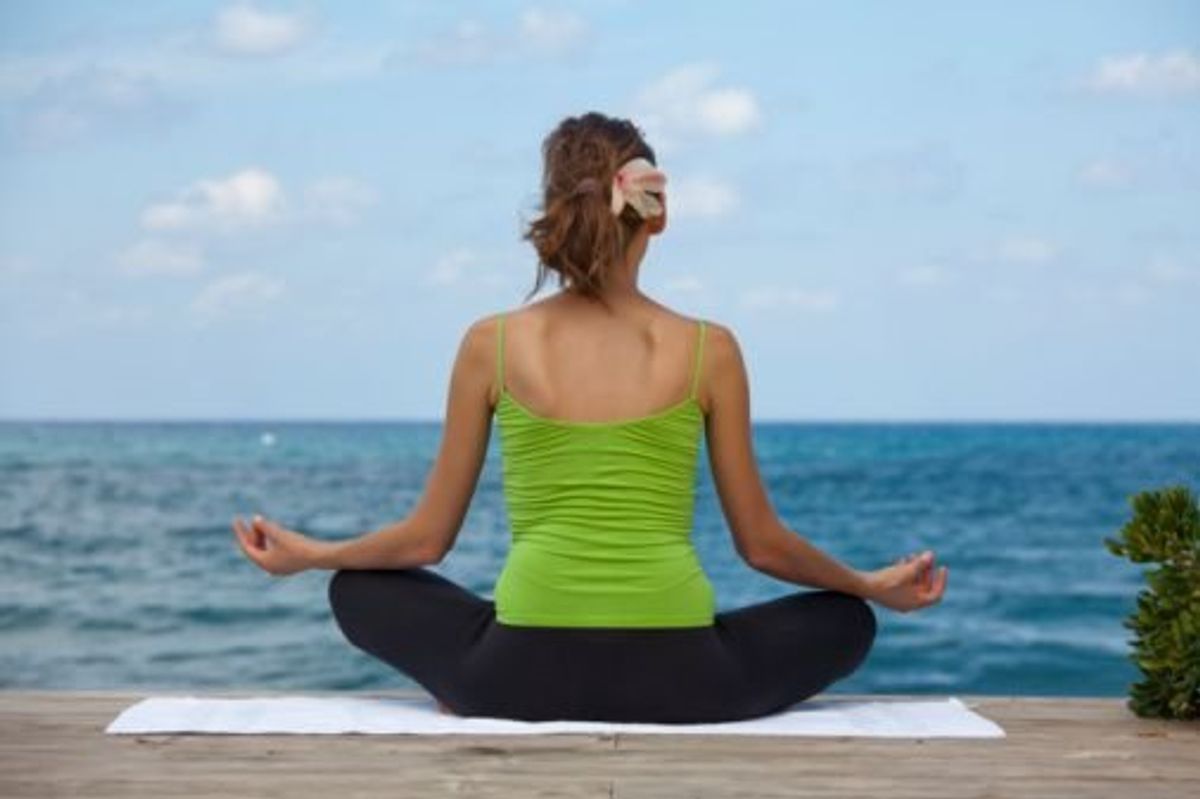 woman practicing yoga