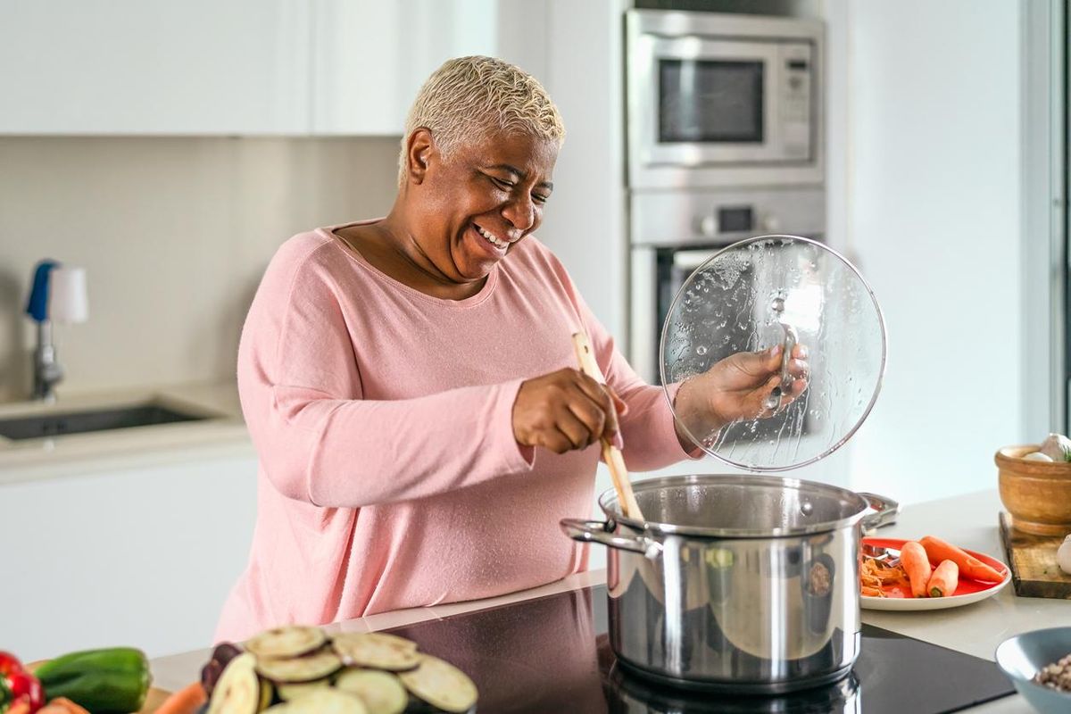 woman preparing lunch in modern kitchen