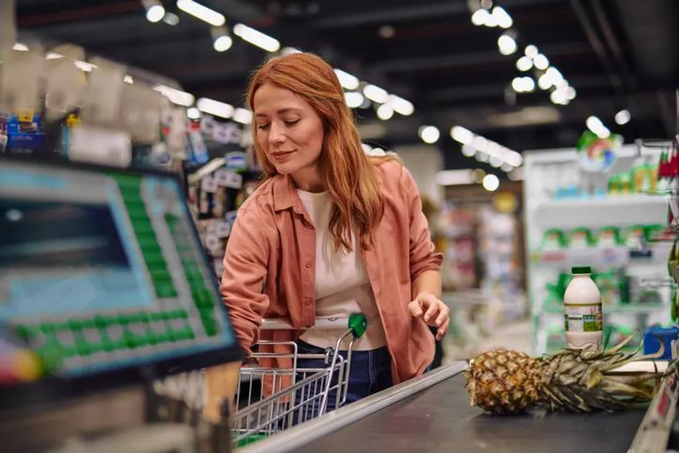 Woman Shopping for Groceries in a Supermarket