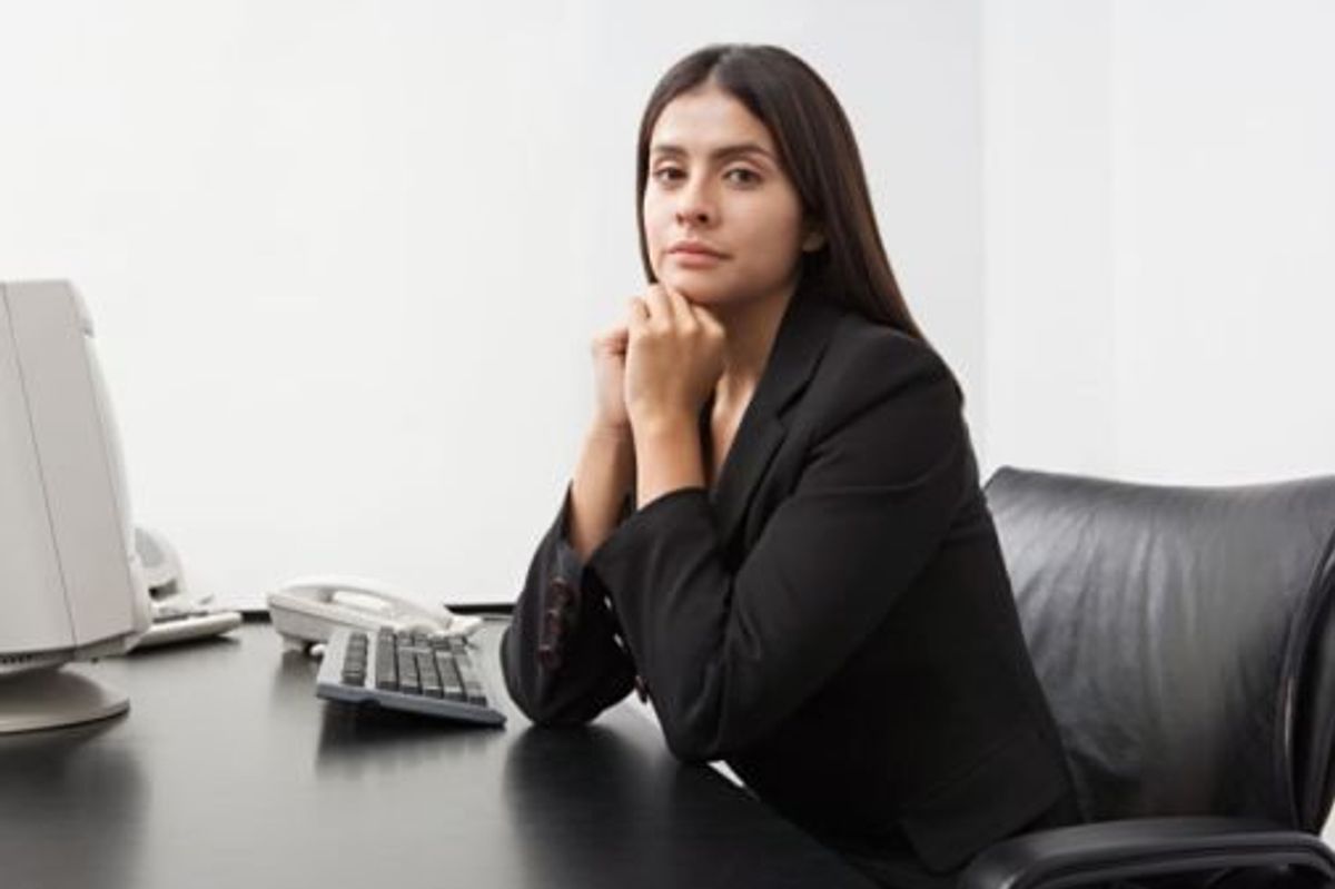 woman sitting at a desk