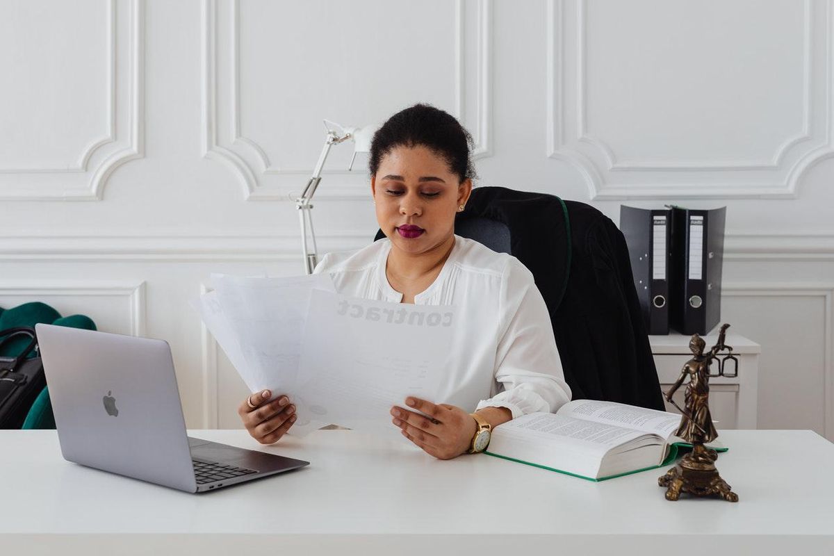 woman sitting at her desk