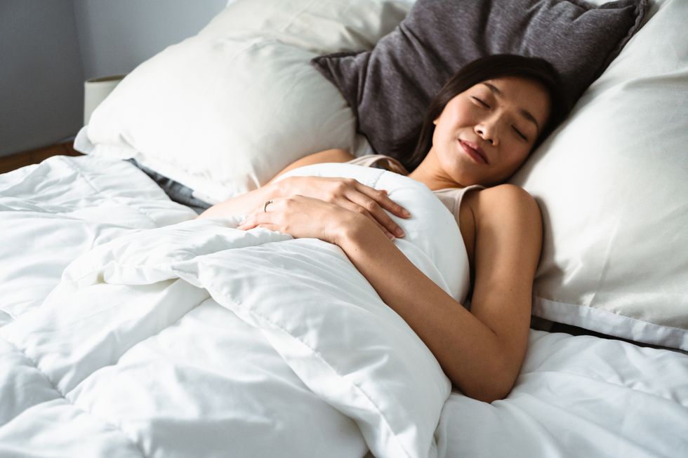 woman sleeping on the bed