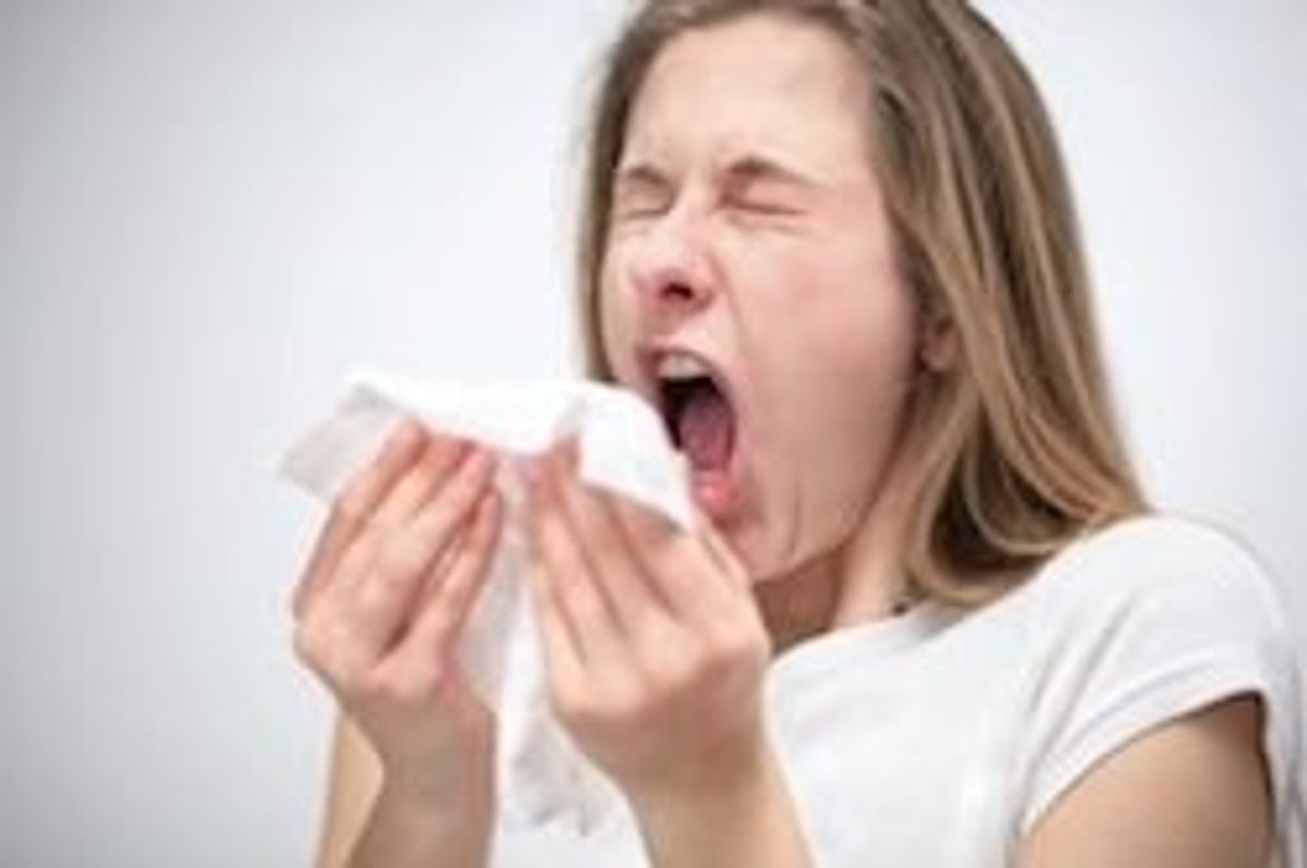 woman sneezing