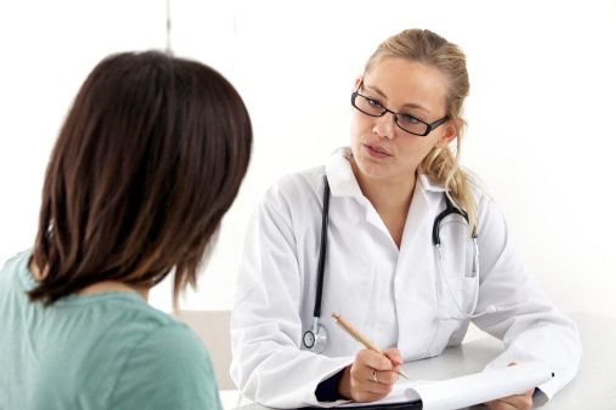 woman speaking to her doctor about overactive bladder