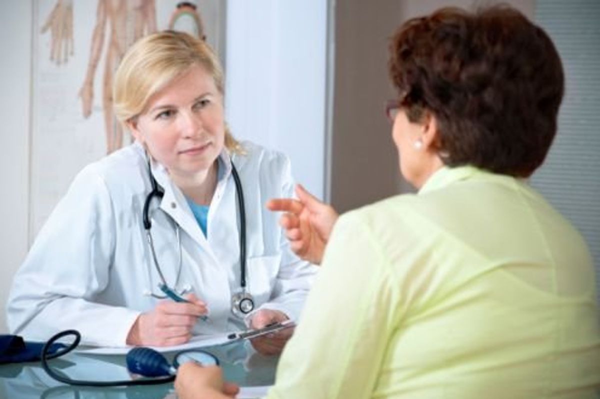 woman speaking with her doctor about stroke