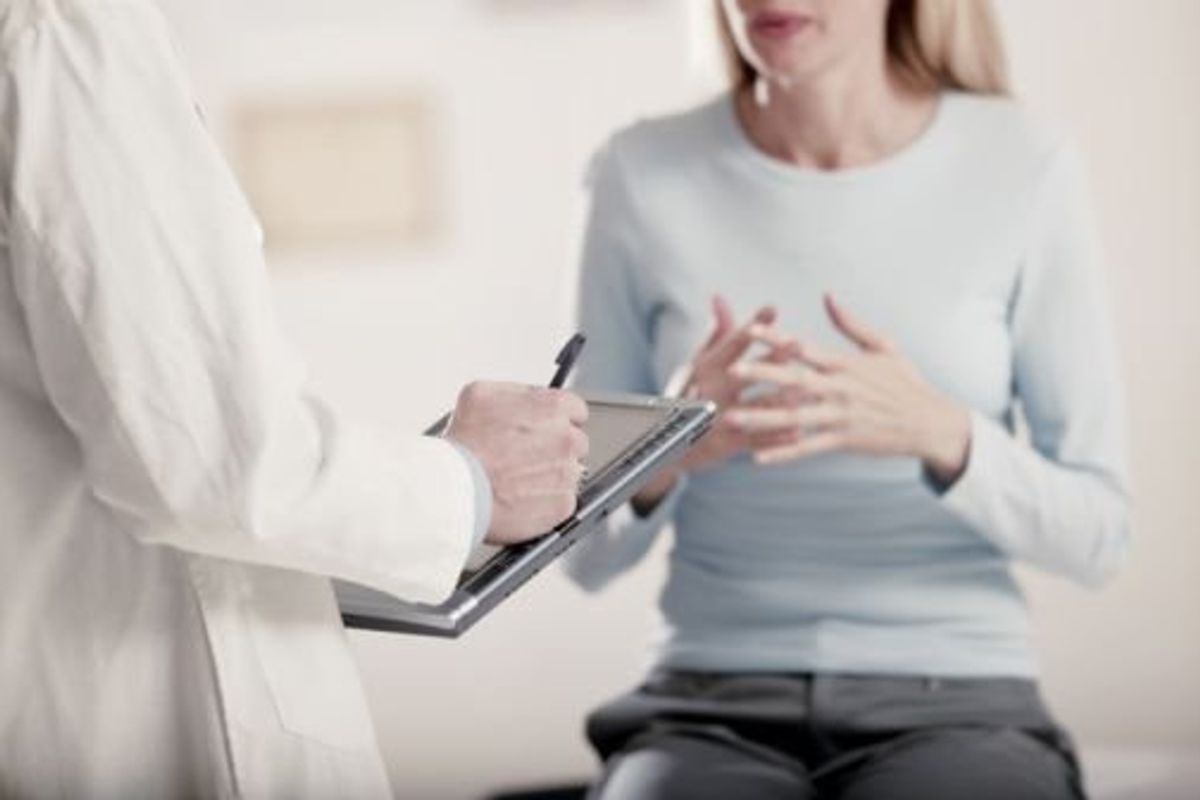 woman speaking with her doctor about von Willebrand Disease