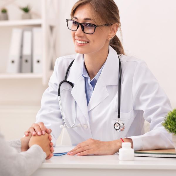 woman speaking with her doctor