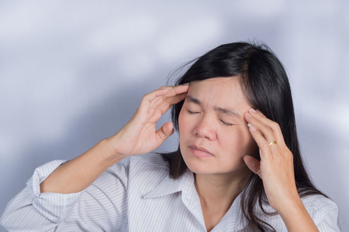 woman suffering from a migraine