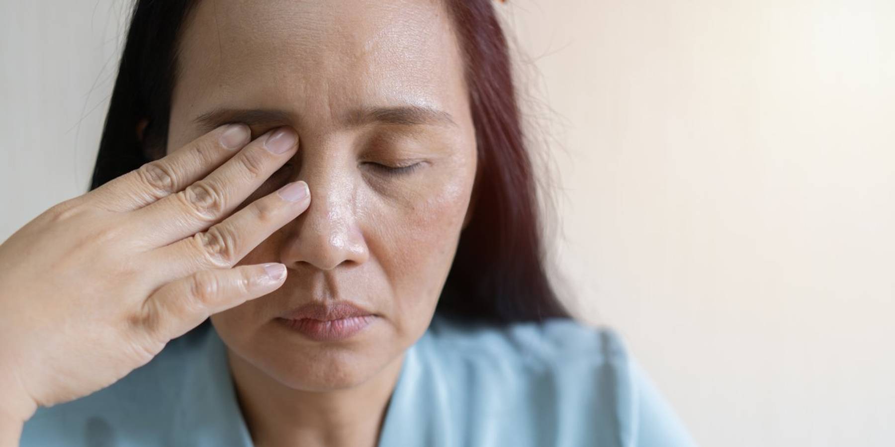 woman suffering from dry eyes