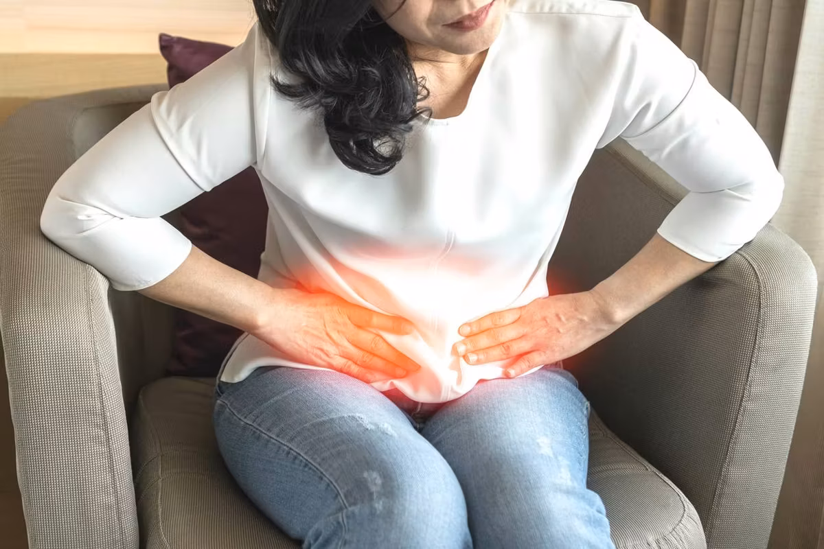 woman suffering from kidney pain, Hyperoxaluria