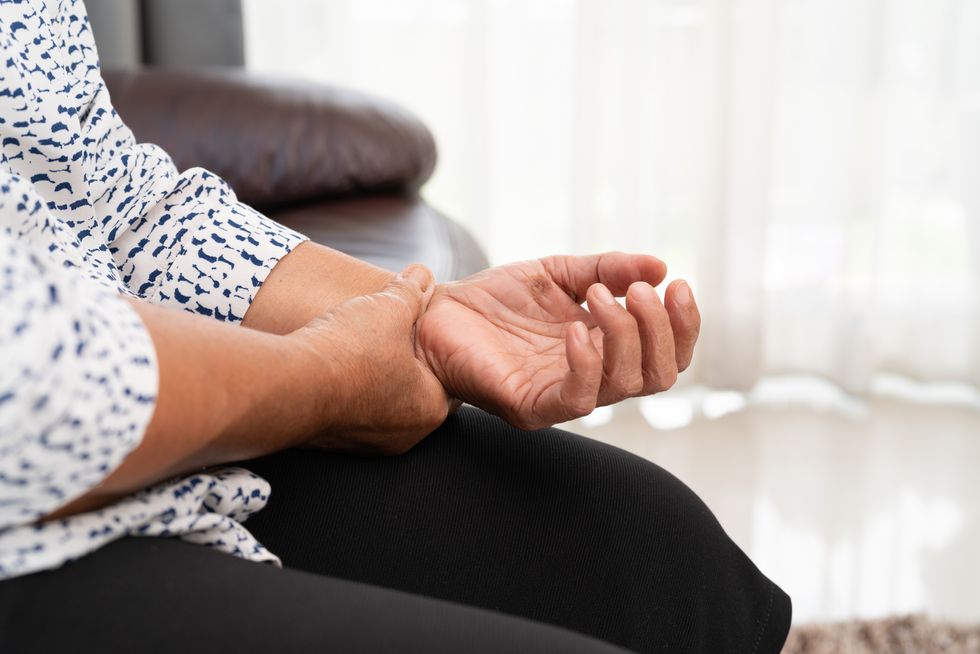 woman suffering from wrist hand pain