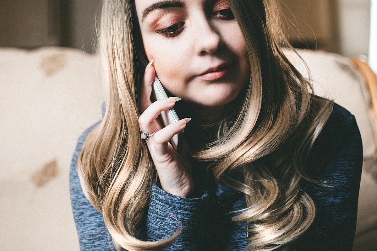 woman talking on a cell phone