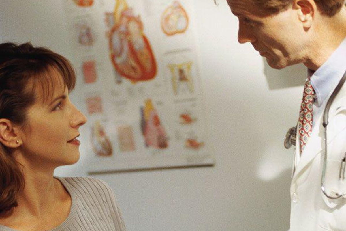 woman talking to a doctor