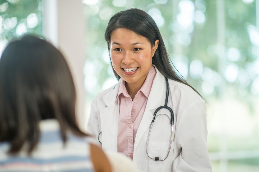 woman talking to her doctor
