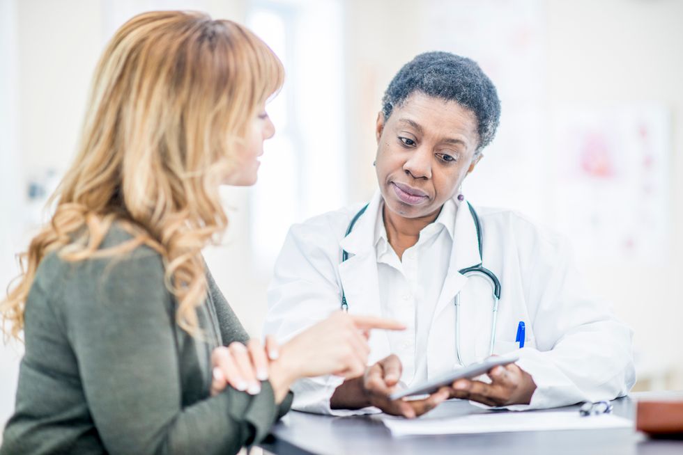 woman talking to her doctor