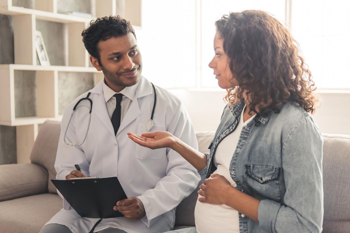 woman talking to her doctor