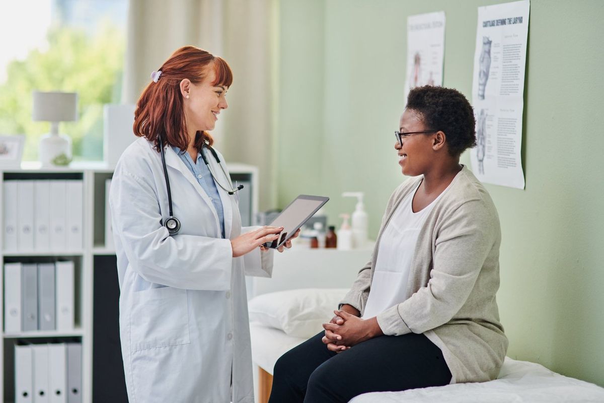 woman visiting her doctor about epilepsy