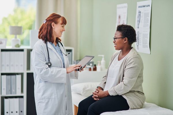 woman visiting her doctor about epilepsy