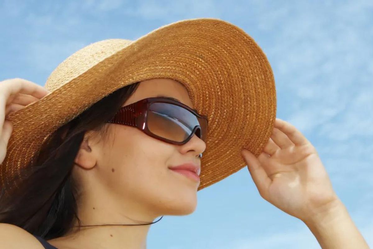 woman wearing a sunhat