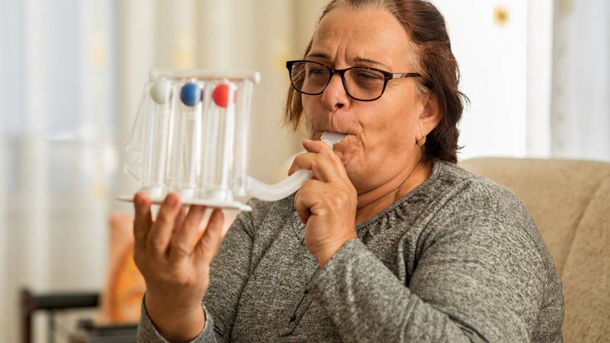 woman with breathing problems at home
