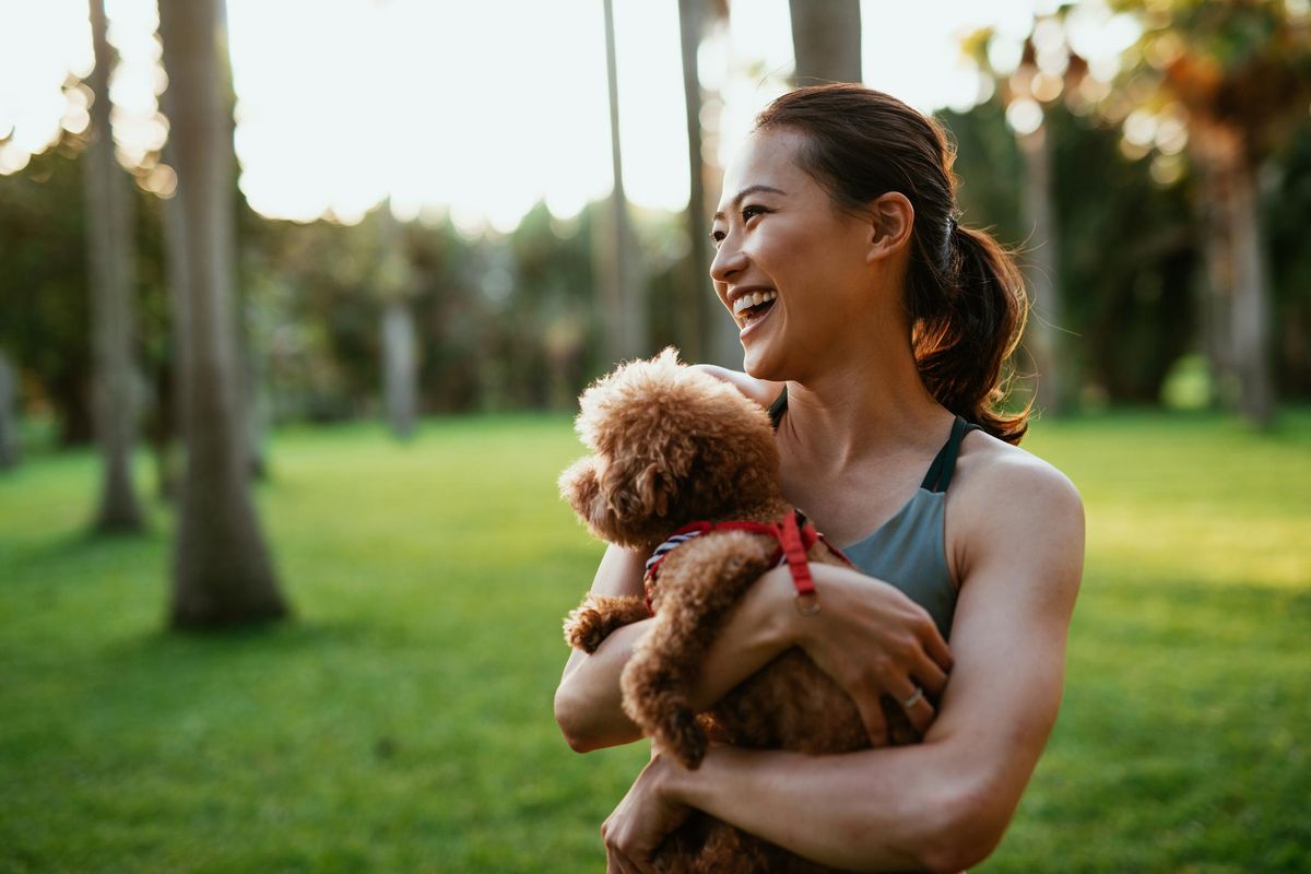 woman with dog in the park