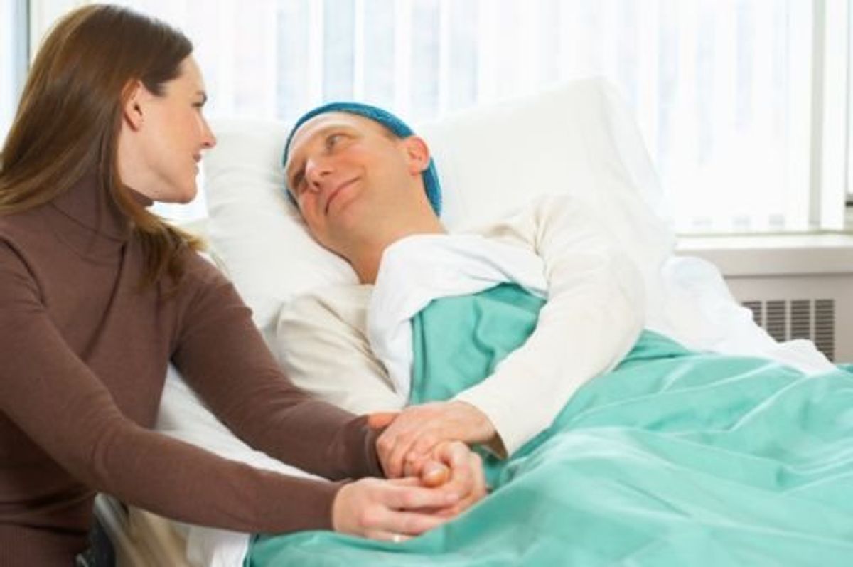 woman with her sick husband in the hospital