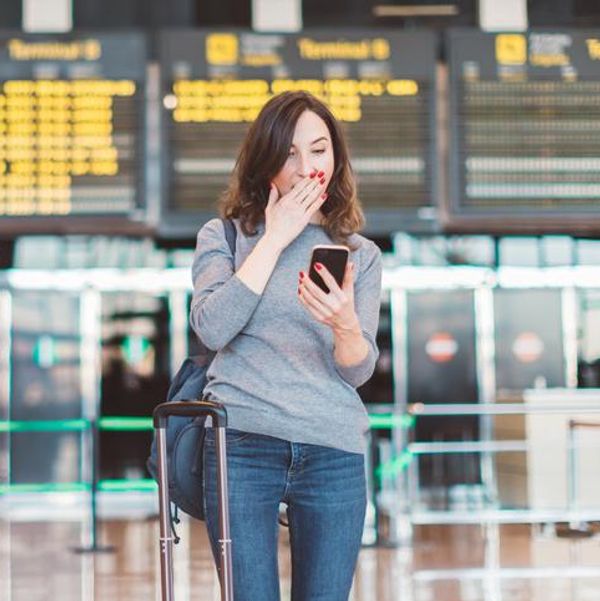 woman with jet lag in an airport