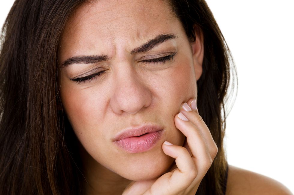 woman with tooth pain