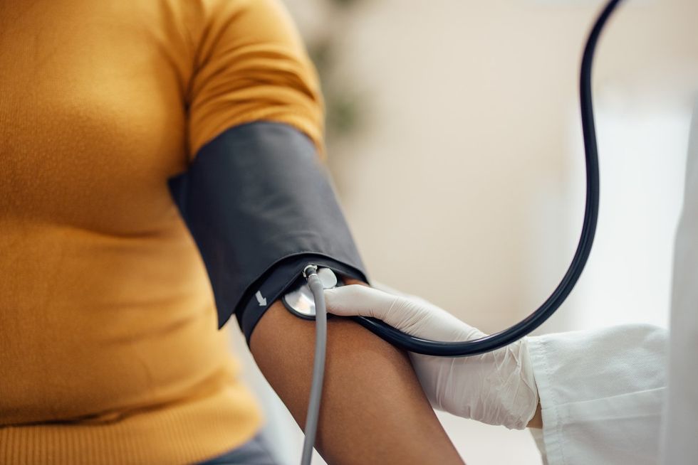 Women getting her blood pressure taken