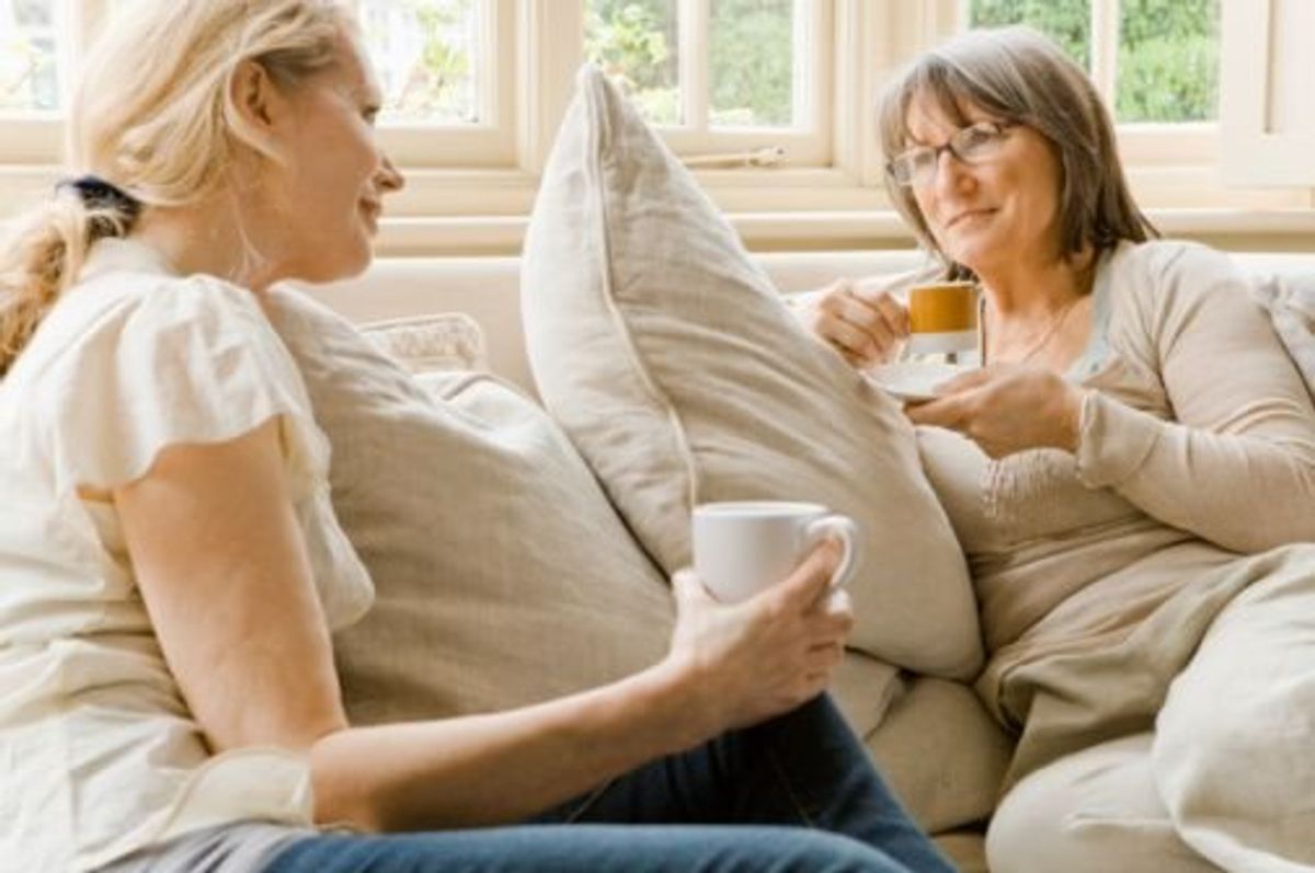 women talking on the couch