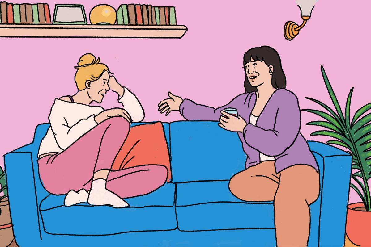 women talking on the couch