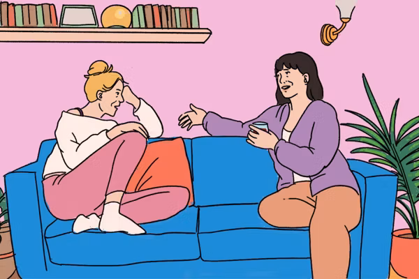 women talking on the couch